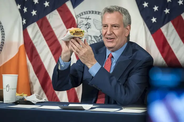 Mayor Bill de Blasio announces partnership with Shake Shack, May 13th, 2021. The fast food chain will provide free burgers or fries to vaccinated New Yorkers.